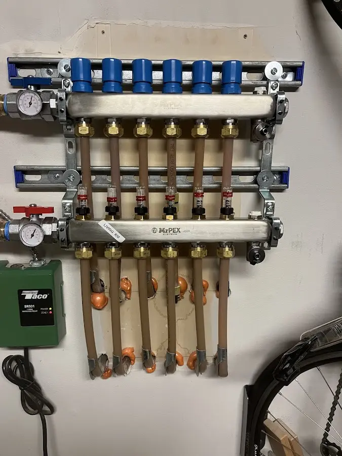 Plumber performing Water Heater Repair at a residential property in Issaquah